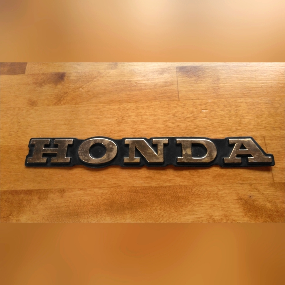 Vintage Honda motorcycle emblem logo